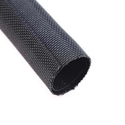 Enroulement métallique tressé textile à fermeture automatique conforme à la norme EN45545